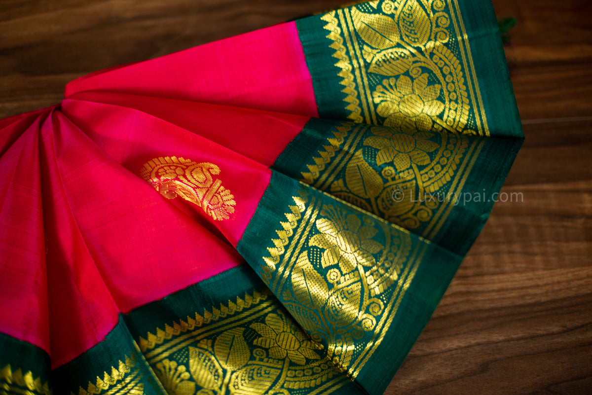 Stunning Tomato Red Kanchipuram Pattu Saree with Mango Golden Butta Design