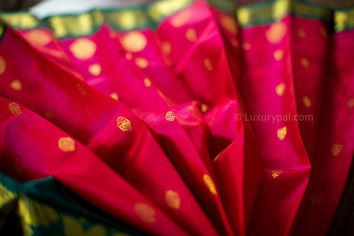 Stunning Tomato Red Kanchipuram Pattu Saree with Mango Golden Butta Design