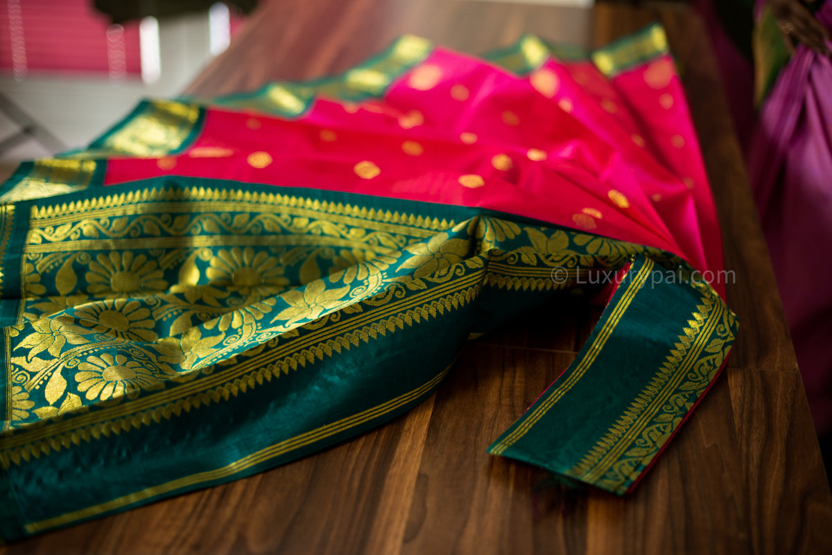 Stunning Tomato Red Kanchipuram Pattu Saree with Mango Golden Butta Design