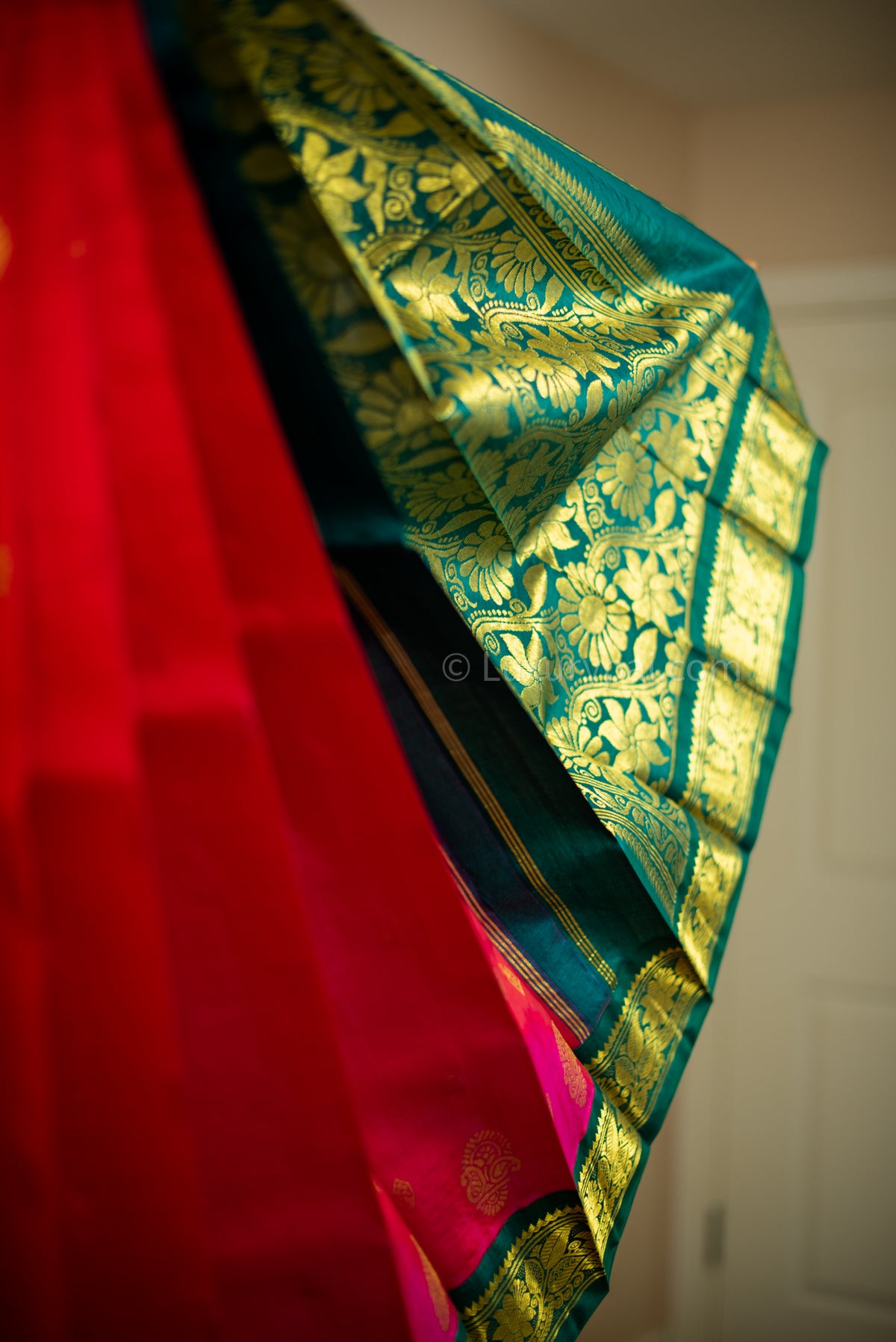 Stunning Tomato Red Kanchipuram Pattu Saree with Mango Golden Butta Design