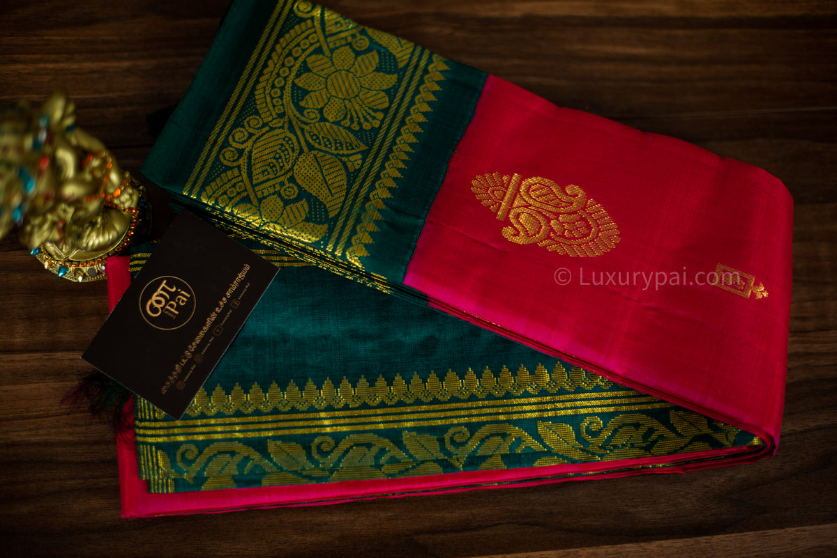 Stunning Tomato Red Kanchipuram Pattu Saree with Mango Golden Butta Design