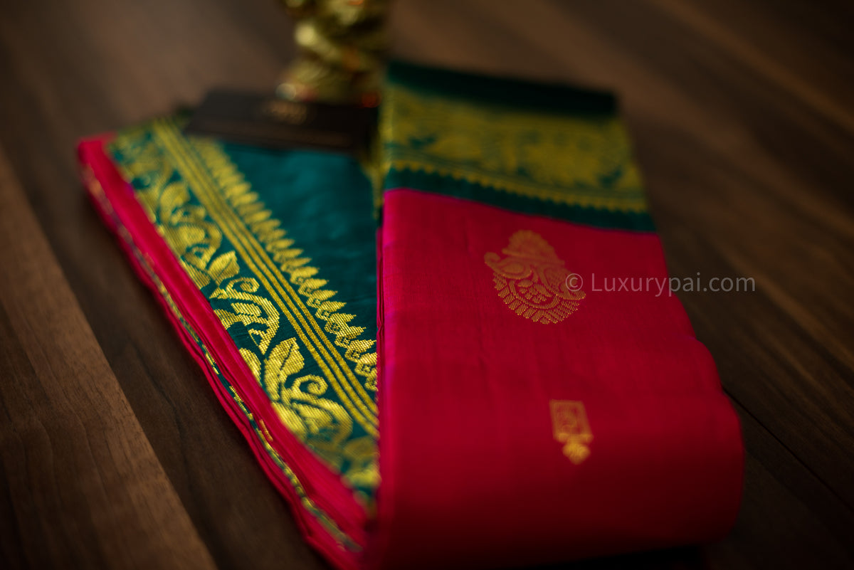 Stunning Tomato Red Kanchipuram Pattu Saree with Mango Golden Butta Design