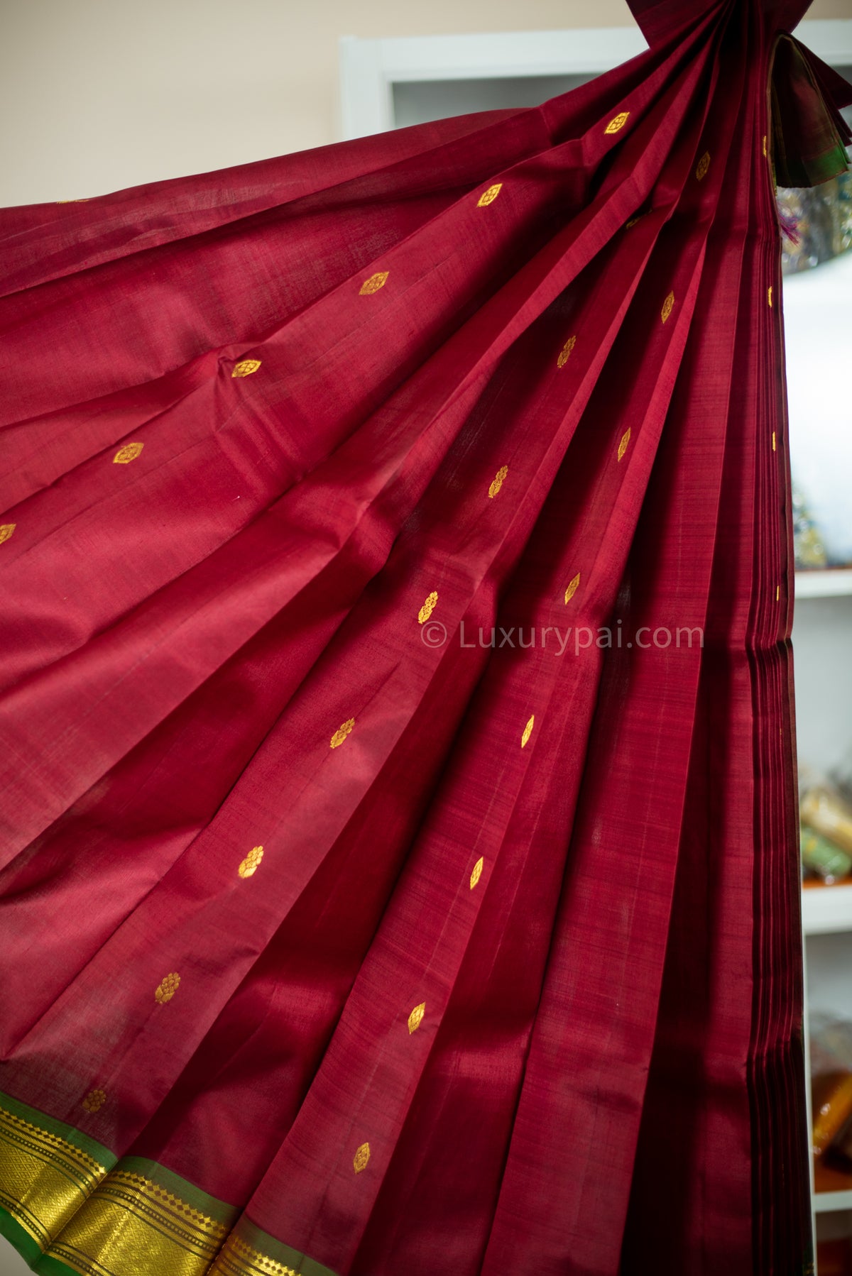 Gorgeous Rakita Rakita Kanchipuram Pattu Saree in Maroon with Butta Design