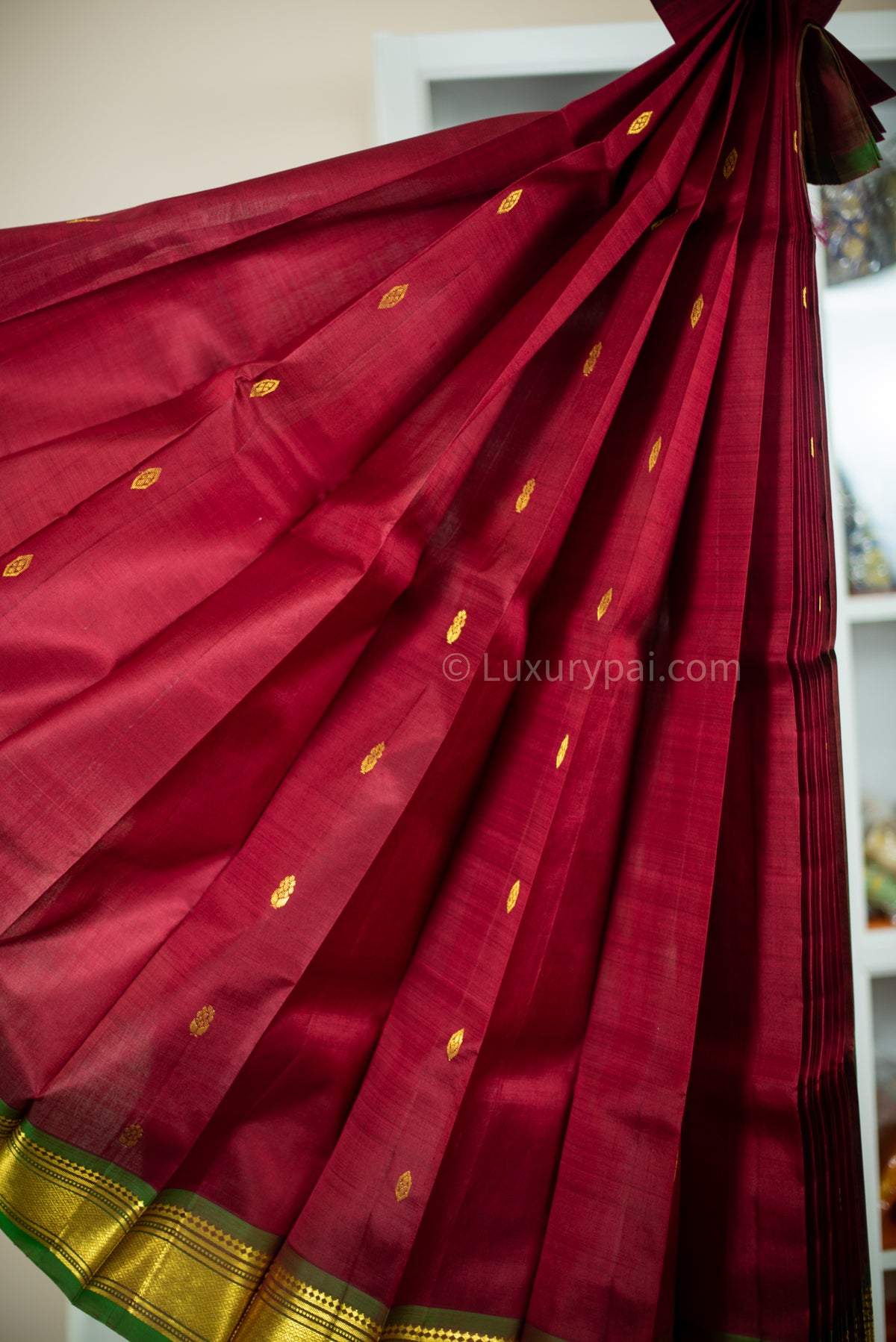 Gorgeous Rakita Rakita Kanchipuram Pattu Saree in Maroon with Butta Design