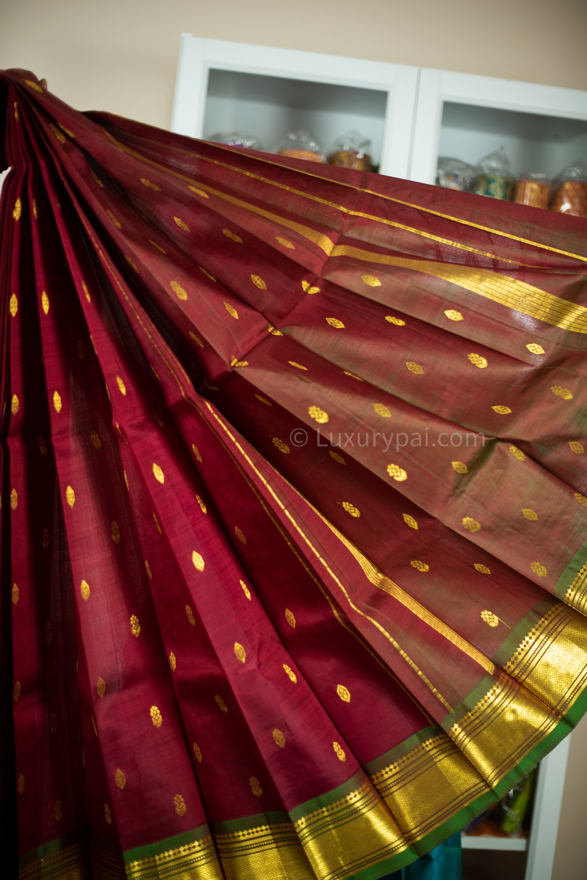 Gorgeous Rakita Rakita Kanchipuram Pattu Saree in Maroon with Butta Design