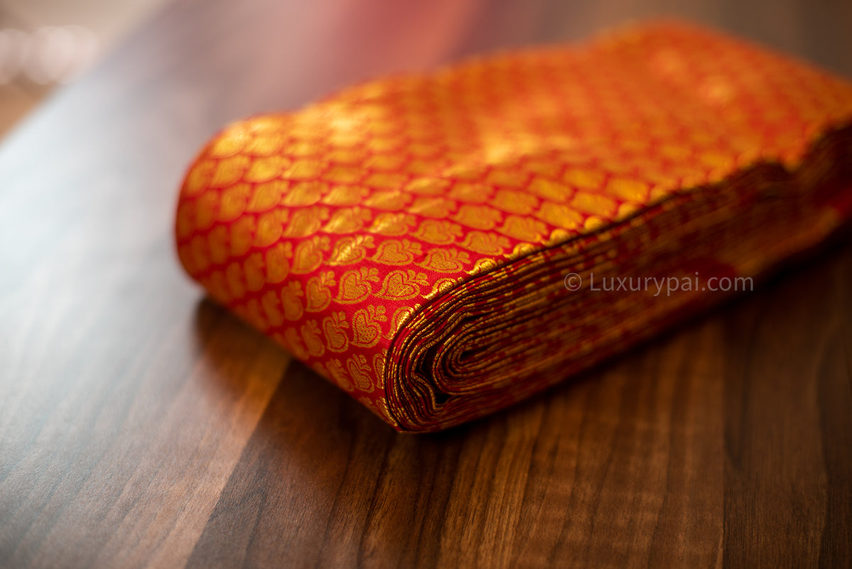 Stunning Tomato Red Kanchipuram Pattu Saree with Exquisite Betel Leaves Design - A Luxurious and Elegant Piece for Any Occasion