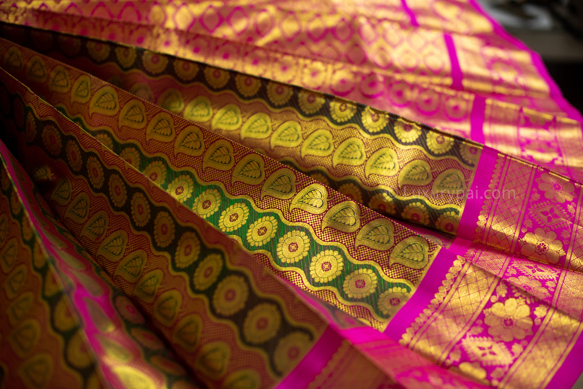 Ethereal Iridescent Kanchipuram Silk Saree with Betel & Chakkara Poo Motifs - Authentic Kai Korvai Weave with Pink Floral Diamond-Edged Border