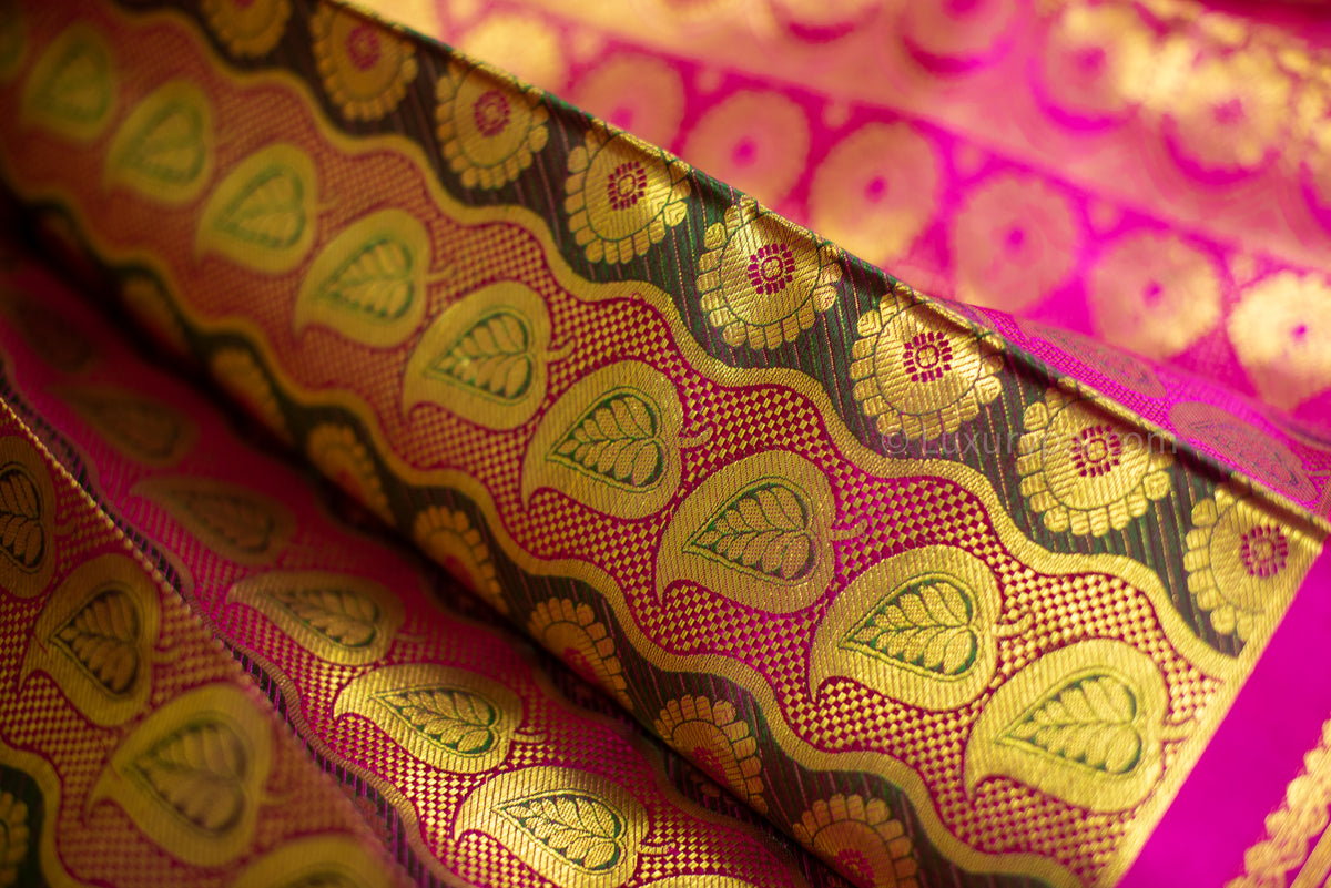 Ethereal Iridescent Kanchipuram Silk Saree with Betel & Chakkara Poo Motifs - Authentic Kai Korvai Weave with Pink Floral Diamond-Edged Border