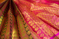 Ethereal Iridescent Kanchipuram Silk Saree with Betel & Chakkara Poo Motifs - Authentic Kai Korvai Weave with Pink Floral Diamond-Edged Border