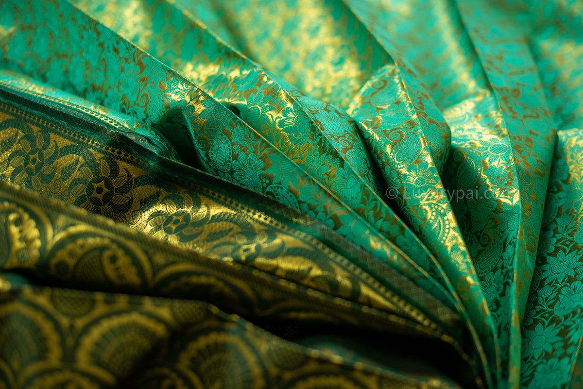 Rexona Green Kanchipuram Silk Saree: Handloom Kai Korvai Weave with Lush Multi-Flower & Chakkara Poo Motifs