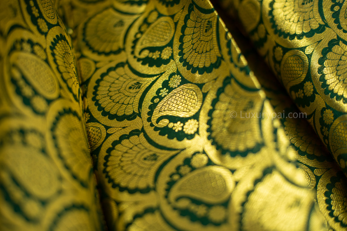 Rexona Green Kanchipuram Silk Saree: Handloom Kai Korvai Weave with Lush Multi-Flower & Chakkara Poo Motifs
