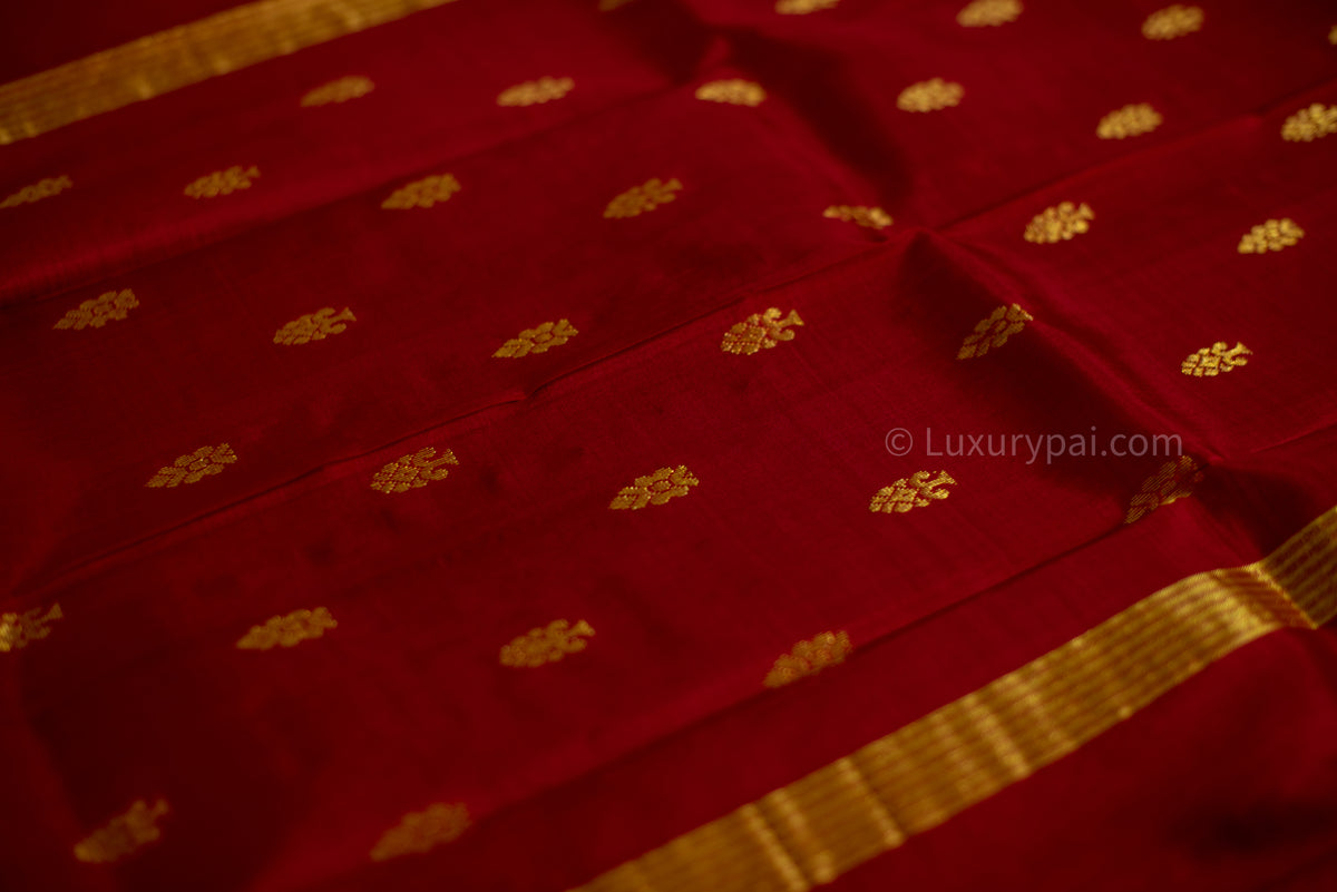 Elegant Kanchipuram Silk Saree in Rich Pakku with Exquisite Butta Work - Authentic Handloom Kai Korvai Craftsmanship with Delicate Kumkumam Border