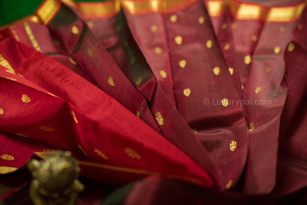 Elegant Kanchipuram Silk Saree in Rich Pakku with Exquisite Butta Work - Authentic Handloom Kai Korvai Craftsmanship with Delicate Kumkumam Border