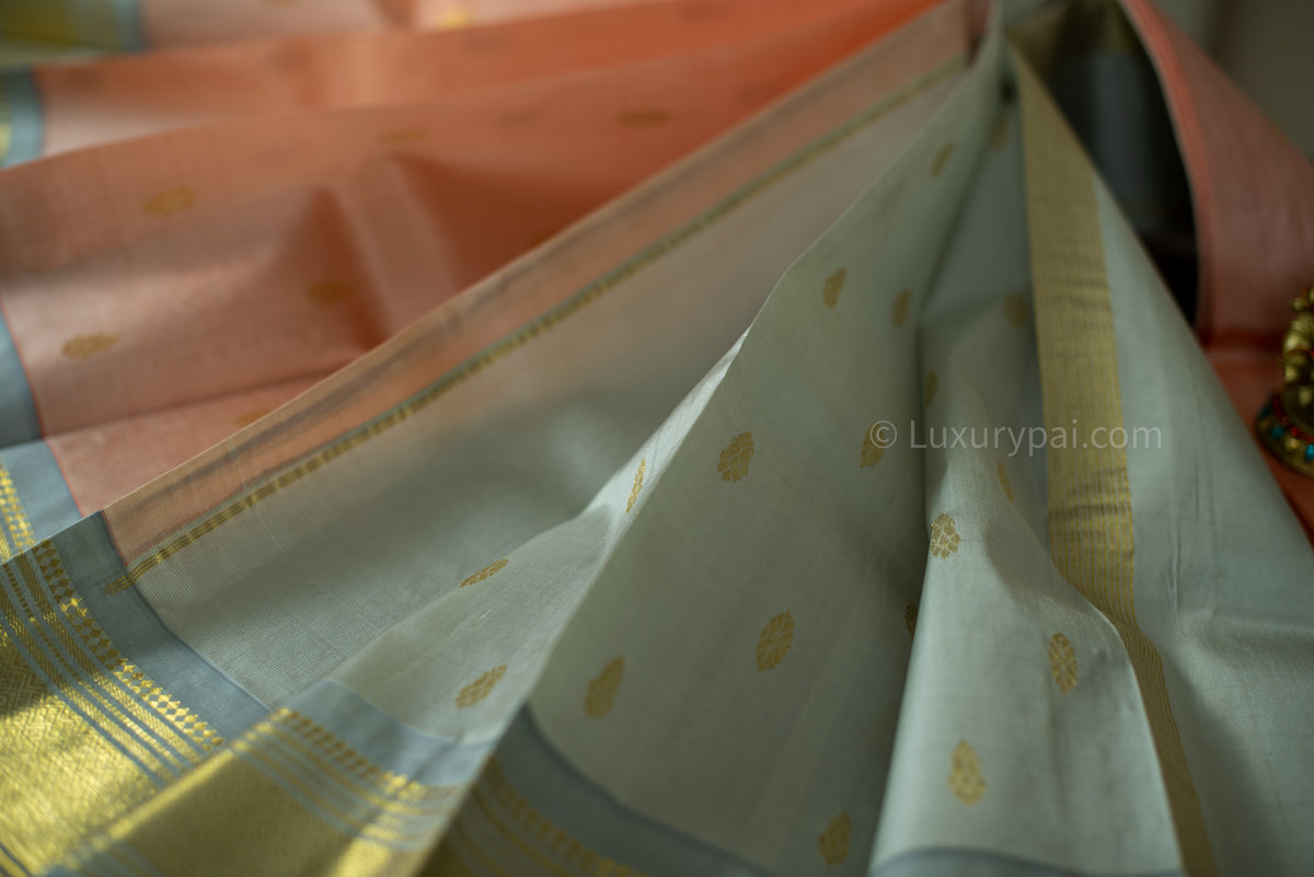 Refined Kanchipuram Silk Saree in Vibrant Kanakambaram Hue with Exquisite Butta Motifs - Artisanal Kai Korvai Weaving with Sophisticated Grey Border
