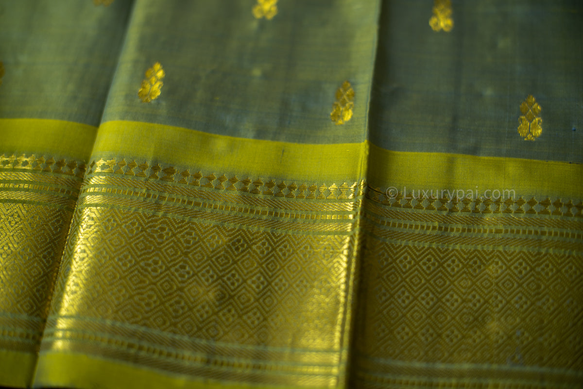 Exquisite Kanchipuram Silk Saree in Ethereal Sky Blue with Intricate Butta Motifs - Traditional Kai Korvai Handloom Artistry with Delicate Fenugreek Green Accents