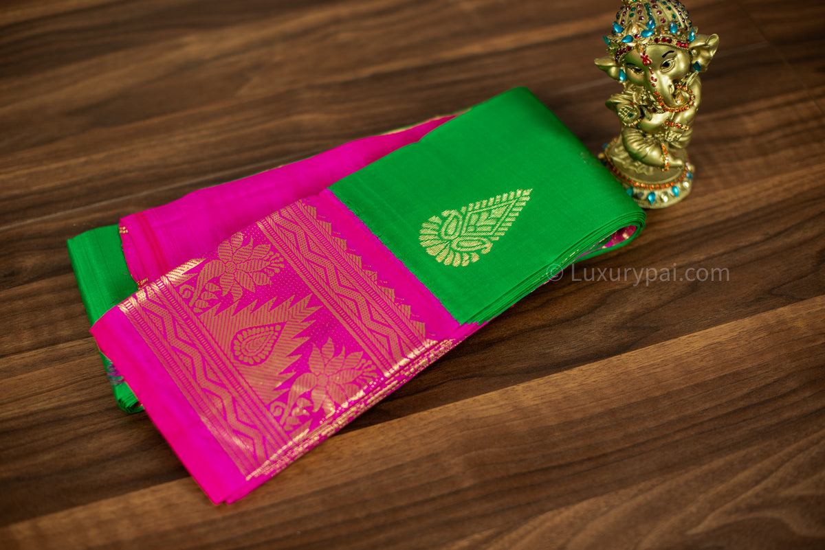 Sophisticated Kanchipuram Silk Saree in Vibrant Parrot Green with Intricate Gana Butta Work - Artisanal Handloom Kai Korvai Weave with Delicate Rose Border