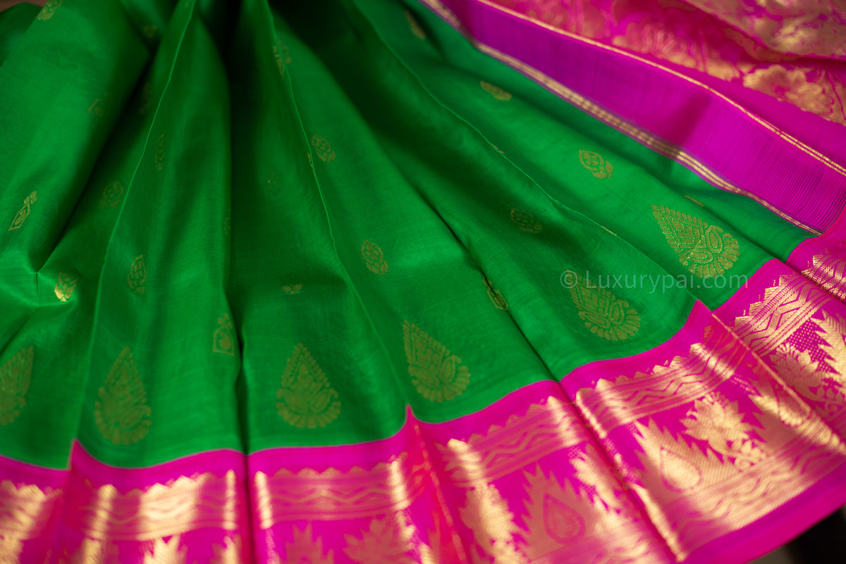 Sophisticated Kanchipuram Silk Saree in Vibrant Parrot Green with Intricate Gana Butta Work - Artisanal Handloom Kai Korvai Weave with Delicate Rose Border