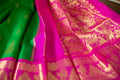 Sophisticated Kanchipuram Silk Saree in Vibrant Parrot Green with Intricate Gana Butta Work - Artisanal Handloom Kai Korvai Weave with Delicate Rose Border