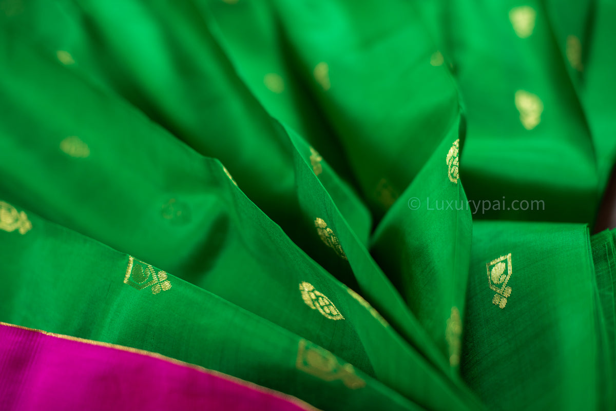 Sophisticated Kanchipuram Silk Saree in Vibrant Parrot Green with Intricate Gana Butta Work - Artisanal Handloom Kai Korvai Weave with Delicate Rose Border