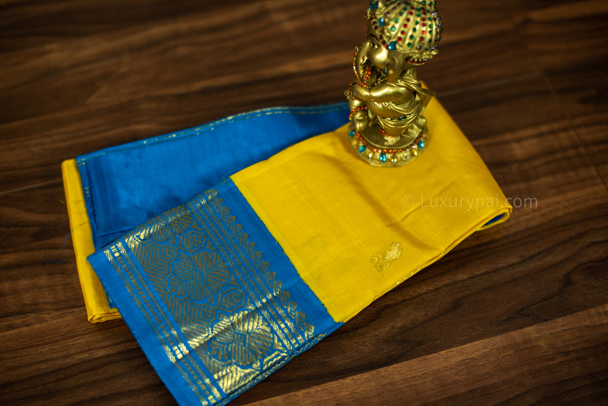 Exquisite Lemon Yellow Kanchipuram Silk Saree with Butta Motifs - Traditional Handloom Kai Korvai Weaving with Anantha Blue Border