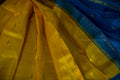 Exquisite Lemon Yellow Kanchipuram Silk Saree with Butta Motifs - Traditional Handloom Kai Korvai Weaving with Anantha Blue Border