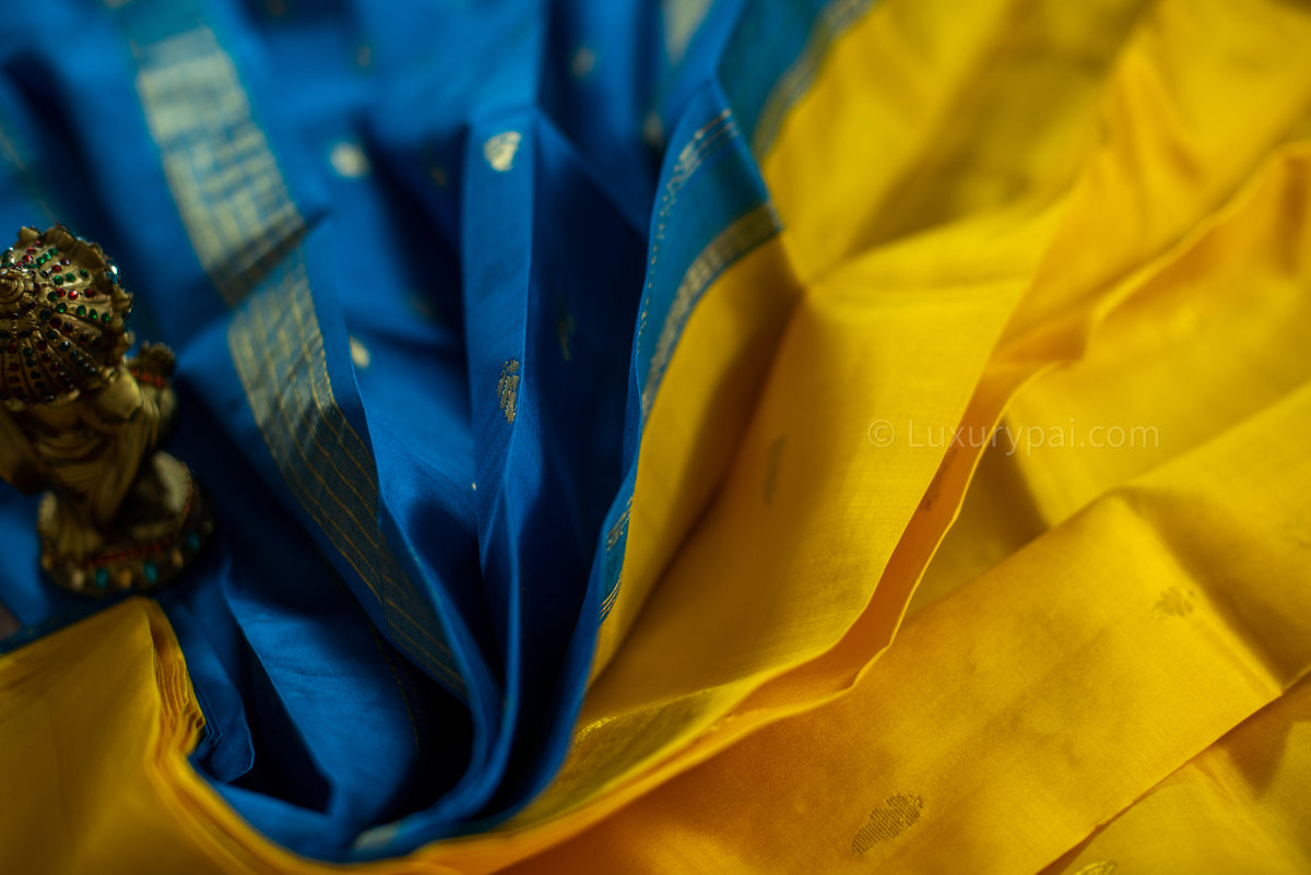 Exquisite Lemon Yellow Kanchipuram Silk Saree with Butta Motifs - Traditional Handloom Kai Korvai Weaving with Anantha Blue Border